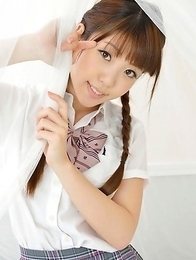 Mizuho Shiraishi with pigtails and uniform sits with ass up Mizuho Shiraishi with pigtails and uniform sits with ass up