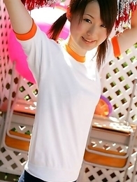 Naoko Sawano in sports outfit plays with balls in garden Naoko Sawano in sports outfit plays with balls in garden