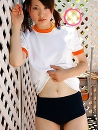 Naoko Sawano in sports outfit plays with balls in garden Naoko Sawano in sports outfit plays with balls in garden